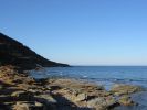 Piccole insenature rocciose a Porto Corallo